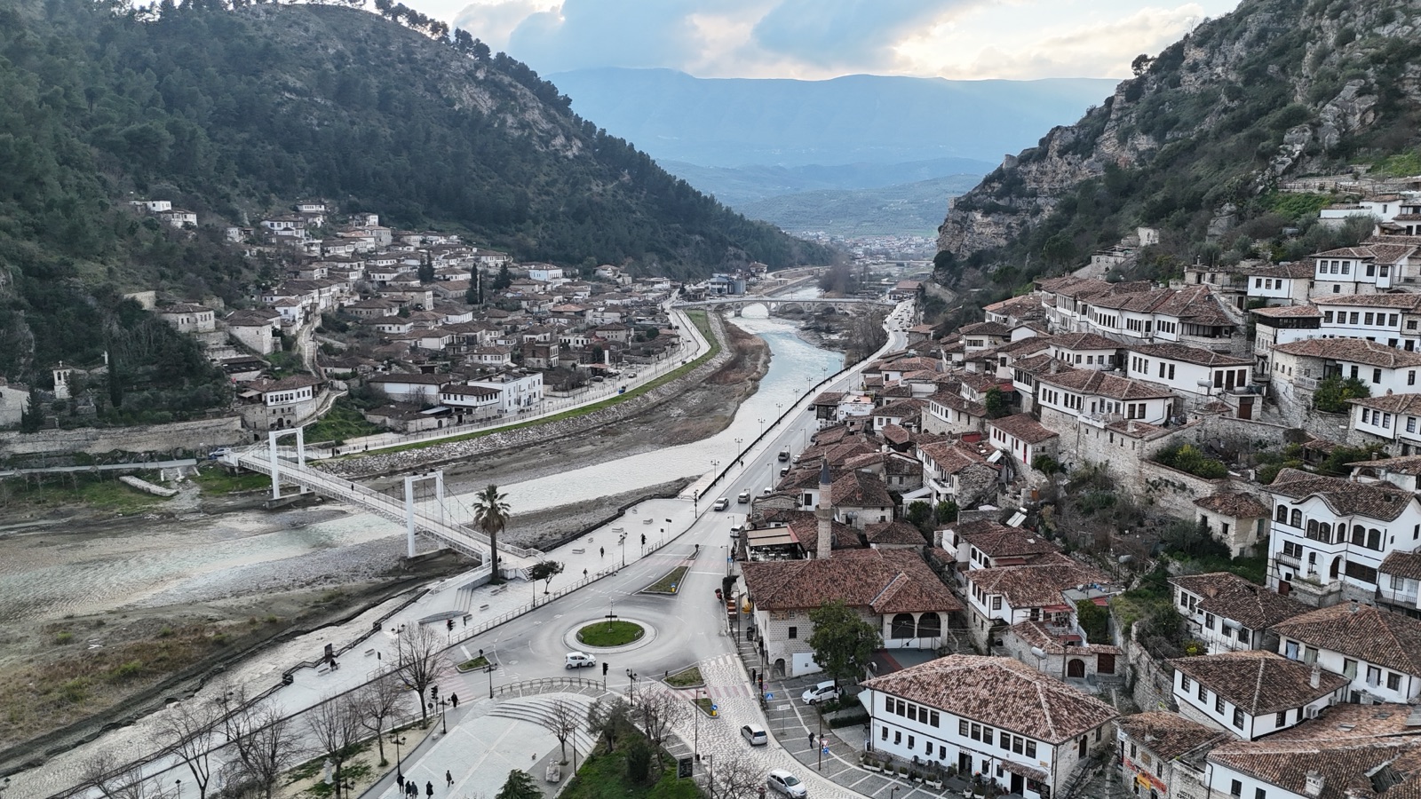 White Ottoman houses stacked on the hillside of Berat, the City of a Thousand Windows